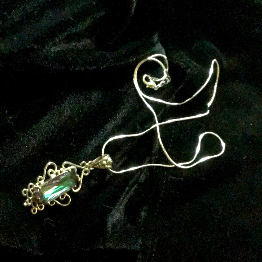 Mystic topaz pendant W/22” silver chain.